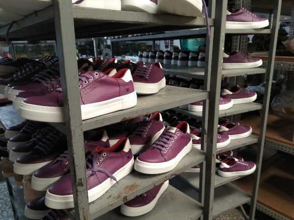 Photo with a model of sneakers in the production phase.